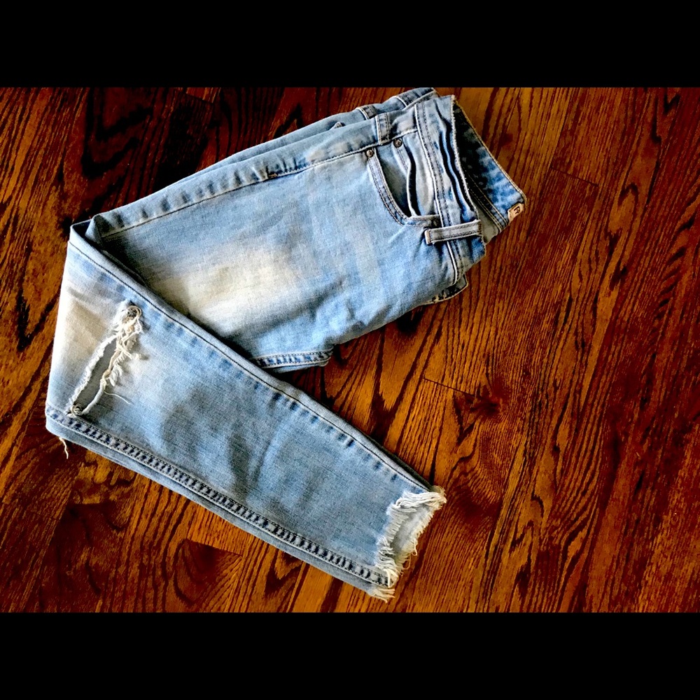 Free people distressed raw him skinny jeans